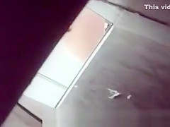 Spying blonde in toilet