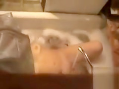 Step sister lets the water from the faucet hit her clitoris