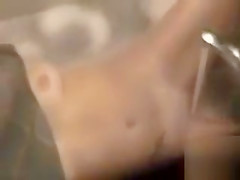 Step sister lets the water from the faucet hit her clitoris