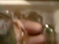 Step sister lets the water from the faucet hit her clitoris