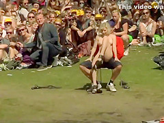 Striptease in front of massive audience