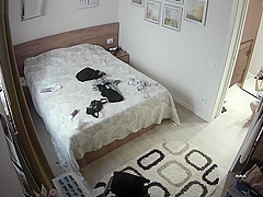 Super sexy women undresing in her bedroom