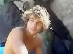 Surfer strips, masturbates