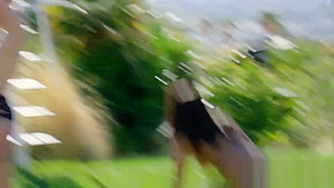 Swinging couples playing with water guns