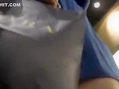 Teenage ass under a skirt at the mall