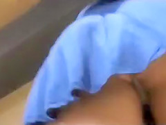 Teenage ass under a skirt at the mall