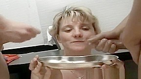 Tempting mature woman blows the cock