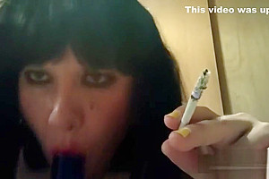 Ts Natalie Jenkins Smoking and sucking on a dildo