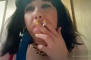 Ts Natalie Jenkins Smoking and sucking on a dildo