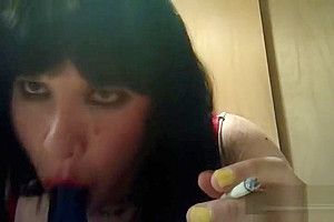 Ts Natalie Jenkins Smoking and sucking on a dildo