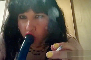 Ts Natalie Jenkins Smoking and sucking on a dildo
