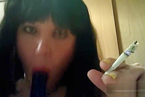 Ts Natalie Jenkins Smoking and sucking on a dildo