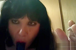 Ts Natalie Jenkins Smoking and sucking on a dildo