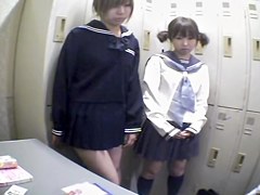 Two Asians blowing on one dong in Japanese sex video