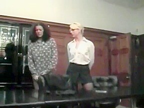 Two employees spanked