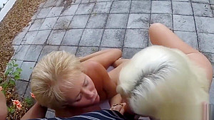Two mature blondes sucking one black dick