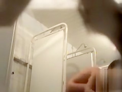 Two seductive coeds enjoy washing their tasty bodies