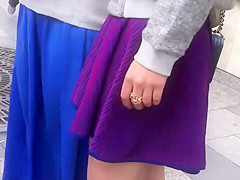 Upskirt look under milf's purple skirt