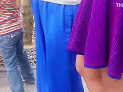 Upskirt look under milf's purple skirt
