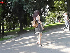 Upskirting g-string footage of brunette with skinny bum