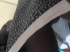 Upskirting g-string footage of brunette with skinny bum