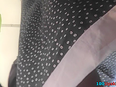 Upskirting g-string footage of brunette with skinny bum