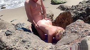 Voluptuous blonde sunbathing nude on the beach fucks passer-by - Erin Electra