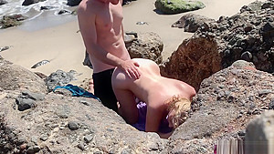 Voluptuous blonde sunbathing nude on the beach fucks passer-by - Erin Electra