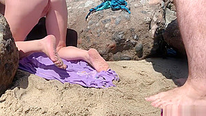 Voluptuous blonde sunbathing nude on the beach fucks passer-by - Erin Electra