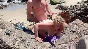 Voluptuous blonde sunbathing nude on the beach fucks passer-by - Erin Electra