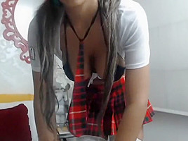 WEBCAM TEASE 50: VOLUPTUOUS BRUNETTE WITH PIGTAILS FLASHES ASS
