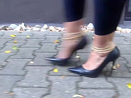 Walking with stilettos full of cum