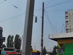 Well-clothed babe upskirt movie scene