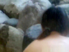 Wet nude Japanese girls in water are watched by hidden guy