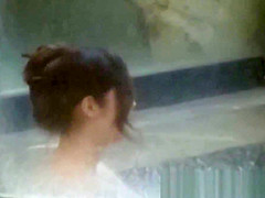 Wet nude Japanese girls in water are watched by hidden guy