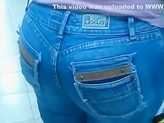 Whale tail peeks out of her trousers