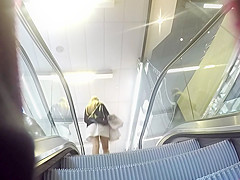 White dress, white string Blonde gal