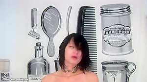 Wild devilish brunette Nova Black pounding her shaved pussy with a black dildo
