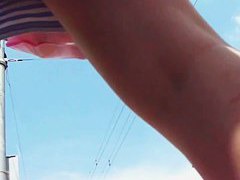 Wind blown upskirt on a perfect pair of legs and cute ass
