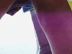 Wind blown upskirt on a perfect pair of legs and cute ass