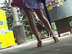 Wind blown upskirt on a perfect pair of legs and cute ass