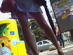 Wind blown upskirt on a perfect pair of legs and cute ass