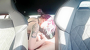 Young tattooed girl with pink hair