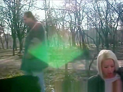 blonde girl peeing in public