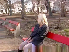blonde girl peeing in public