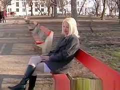 blonde girl peeing in public