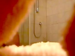 cam in bathroom filmed a gal taking shower