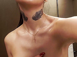 camgirl with a weird tattoo on her neck