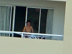 girl nude in balcony argentina far away ( 200 m)