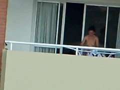 girl nude in balcony argentina far away ( 200 m)